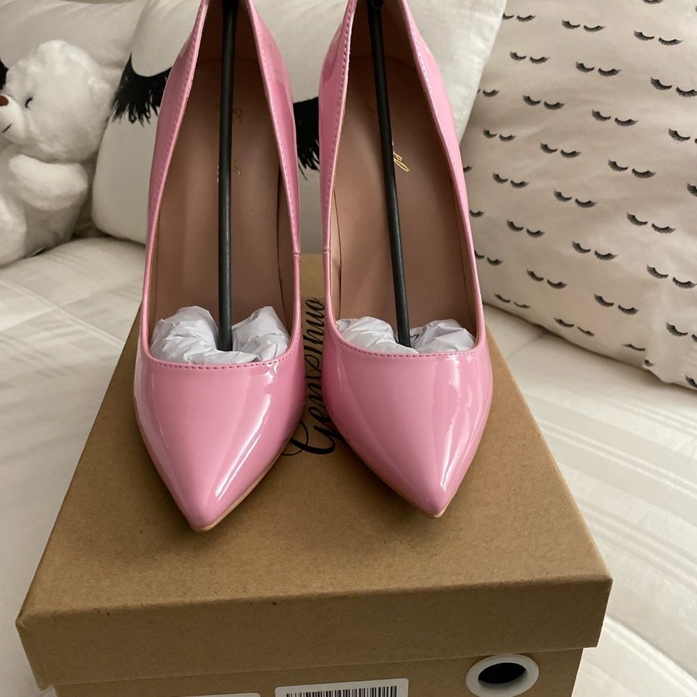 7 inch Stiletto’s, size 7, Lt Pink. Never worn.